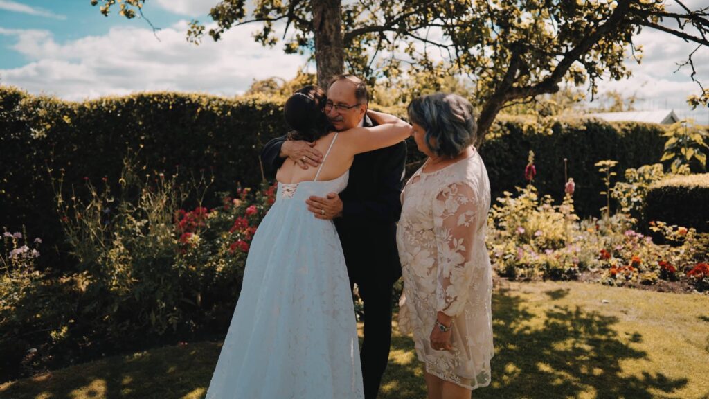 Father of bride reaction by Durham castle wedding videographer