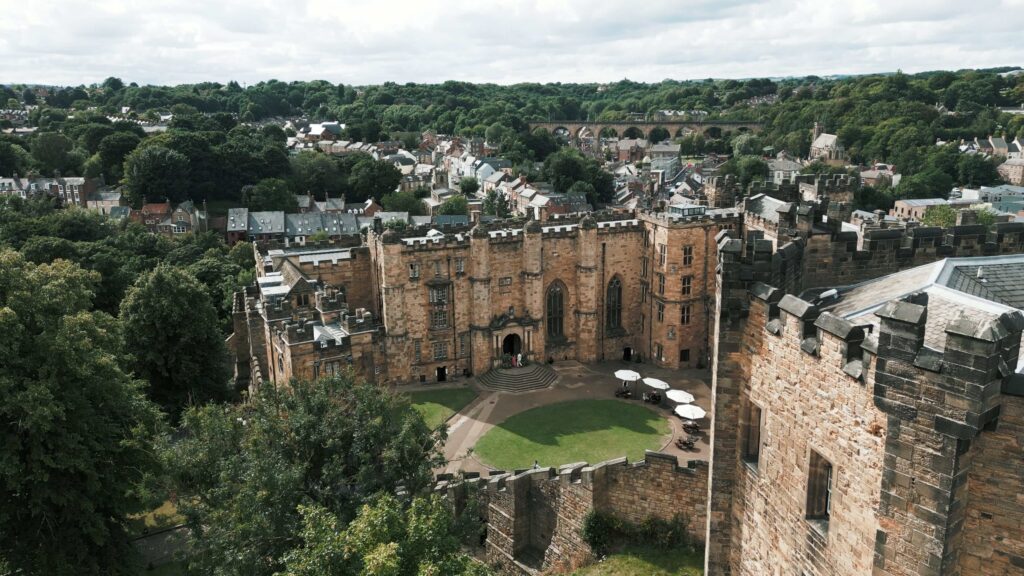 Drone shot of Durham Castle by Durham castle wedding videographer